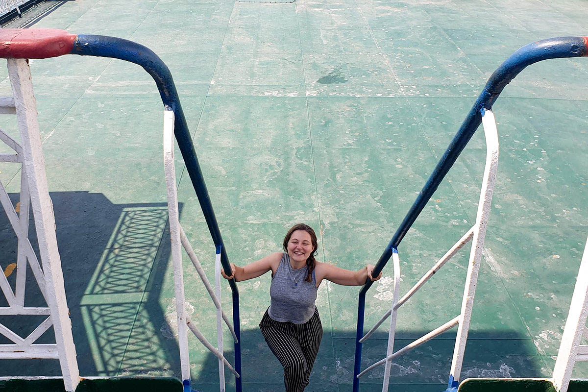 Girl walking up ladder on Caspian Sea ferry