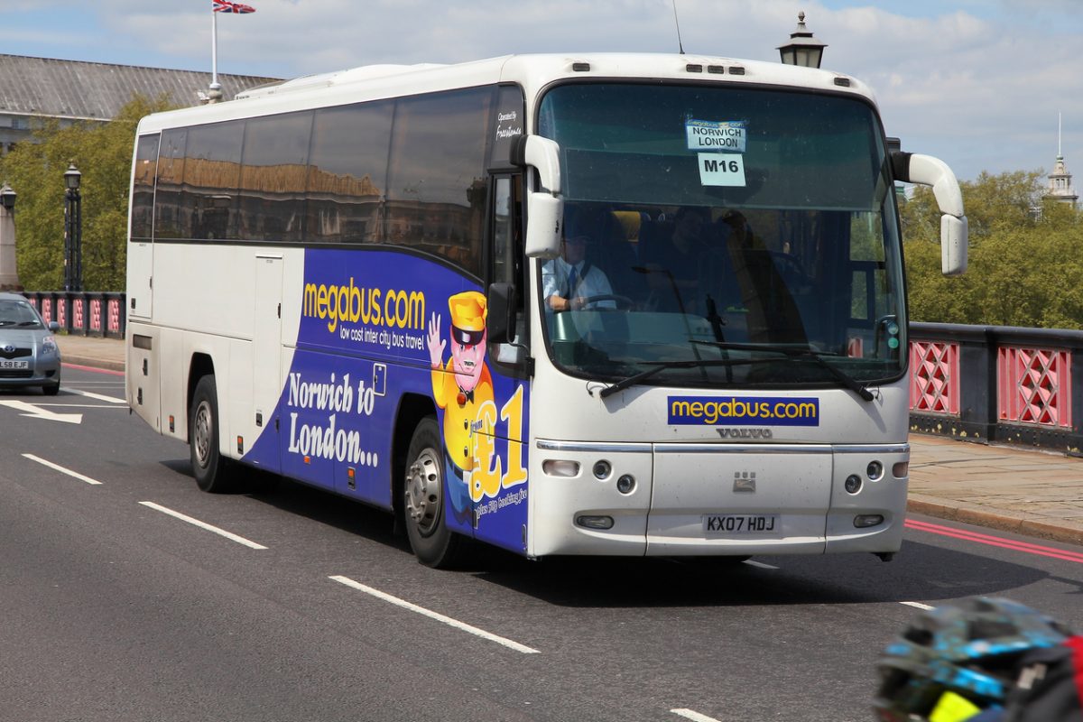 People ride Megabus coach in London. Megabus is a low coast inter city passenger transportation company owned by Stagecoach Group.