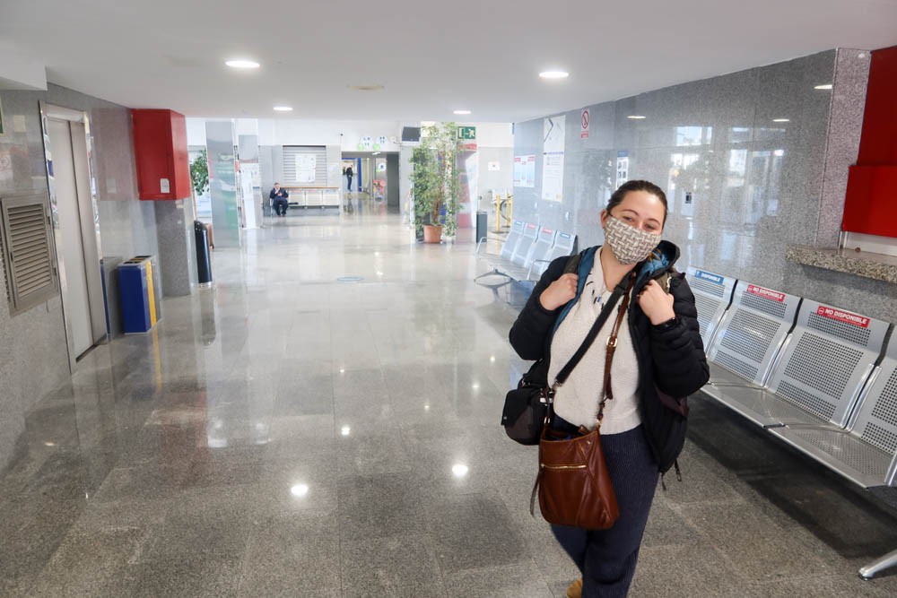 Girl with face mask in ferry port in Palma de Mallorca