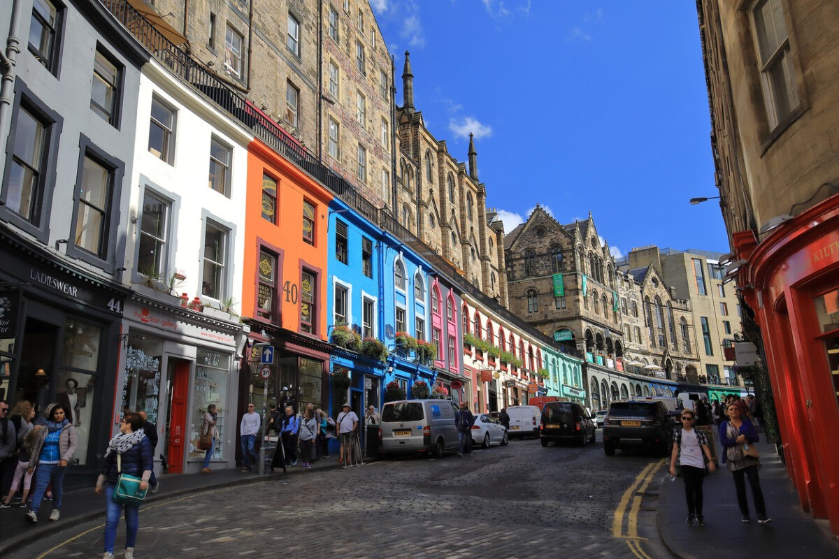 Edinburgh, Scotland, United Kingdom, August 9, 2018 : Tourists walking in the Victoria Street.