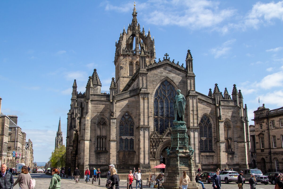 Edinburgh, Scotland, United Kingdom - April 27, 2022: View of St. Giles Cathedral, also called the High Kirk of Edinburgh, along the Royal Mile in Edinburgh’s Old Town district.