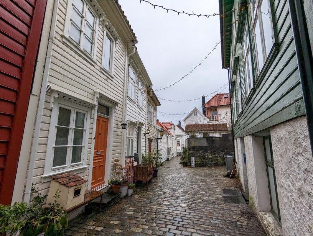 Cobbled street with wooden buildings on either s