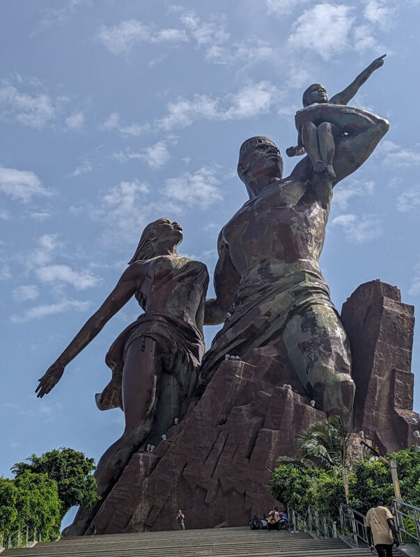 The African Renaissance Monument standing against a blue sky
