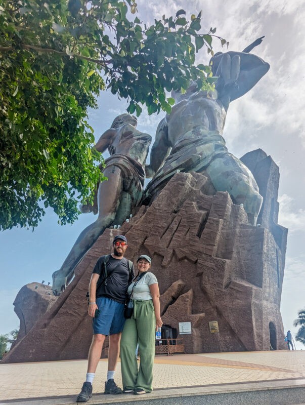 Claire and Richard standing in front of the African Renaissance Monument